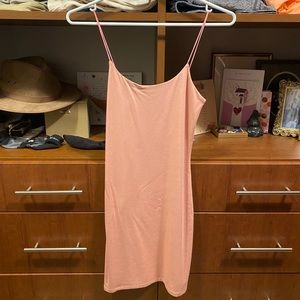 A Wilfred/Aritzia bodycon dress in pastel rose